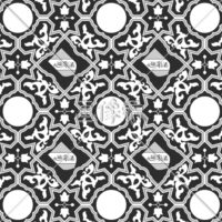 白黒のアラビア調のパターンタイル模様