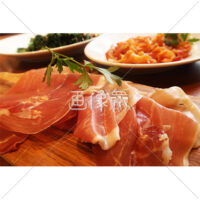 バジルの乗った生ハムの写真素材