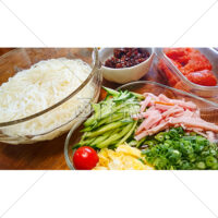 そうめんといろとりどりの具材の写真素材