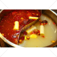 とても辛そうな薬膳火鍋の写真素材