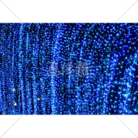 クリスマスの青いライトアップの写真素材