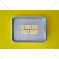 調理バットに載せた200gのバターの写真素材(7)