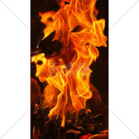 暗闇の中燃え盛る炎の写真素材