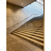 地下の通路から地上に上る階段の写真素材