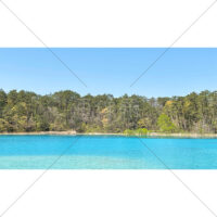 鮮やかな水色の水面の写真素材